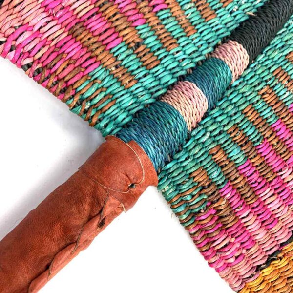 bashiri-fan-s1-274-gust-bolga-hand-fan-woven-2 Close-up of the weave and leather handle on the pink, teal and orange Bolga fan