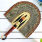 Woven Bolga hand fan in black and natural with a leather-wrapped handle