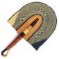 Full view of the orange and black woven Bolga fan on a white background