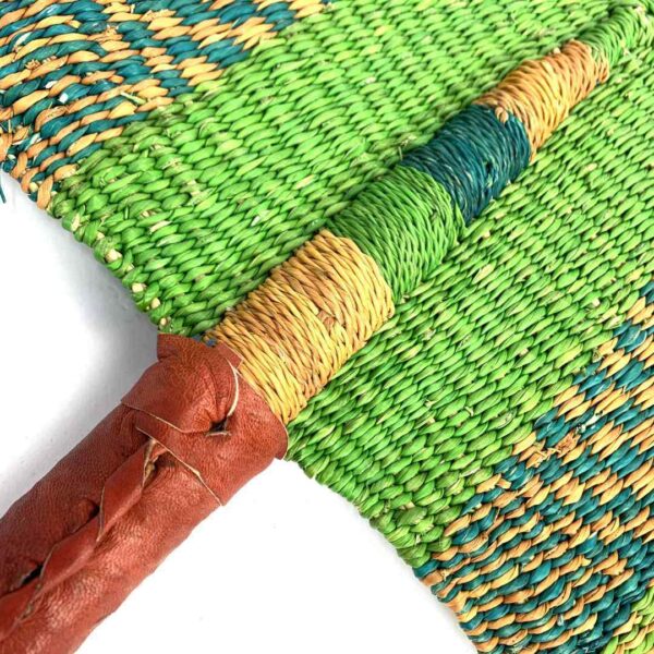 bashiri-fan-s1-280-flight-woven-fan-handmade-2 Close-up of the weave and leather handle on the green and teal Bolga fan