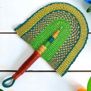 Woven Bolga hand fan in green and teal with a leather-wrapped handle