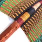Close-up of the weave and leather handle on the green and orange Bolga fan