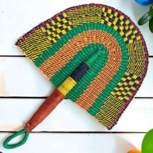 Woven Bolga hand fan in purple and green with a leather-wrapped handle