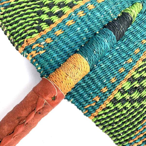 bashiri-fan-s1-285-ohmy-bolga-fan-elephant-grass-2 Close-up of the weave and leather handle on the lime and teal Bolga fan