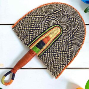 Woven Bolga hand fan in black and orange with a leather-wrapped handle