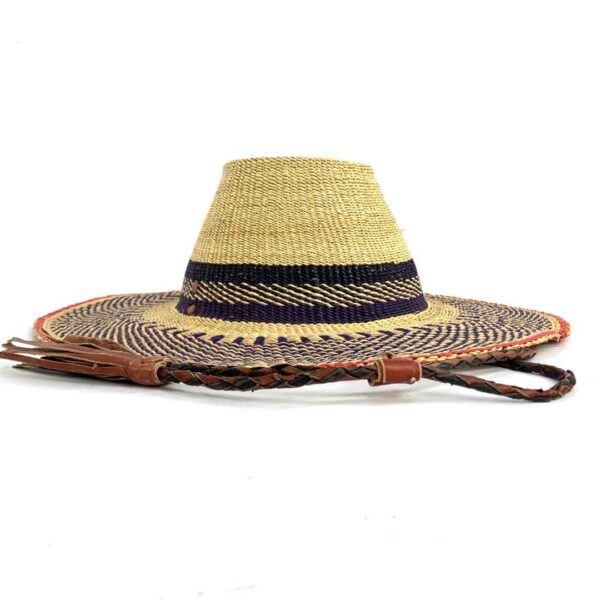 bashiri-hat-wide-367-hugo-bolga-hat-wide-brim-2 Side profile of the navy and natural wide brim Bolga hat on a white background