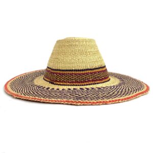 bashiri-hat-wide-368-oompa-african-straw-hat-woven-2 Side profile of the orange and brown wide brim Bolga hat on a white background