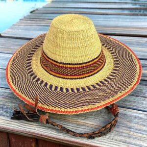 Wide brim Bolga hat with a natural crown and orange and brown band