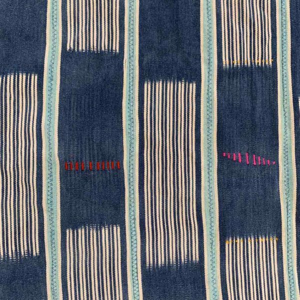 bashiri-indigo-cotton-230-wa-african-cotton-fabric-woven-3 Close-up of the indigo cotton cloth with solid and pinstriped panels