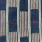 Close-up of the indigo cotton cloth with solid and pinstriped panels