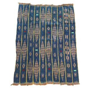 Full view of the indigo cotton cloth with chains of warm-toned diamonds on a white background
