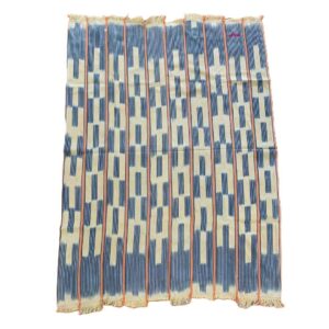 Full view of the pale cotton cloth with stepped indigo bars and blocks on a white background