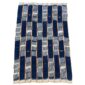 Full view of the deep indigo cotton cloth with pale striped bands on a white background