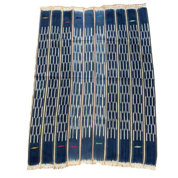 bashiri-indigo-cotton-237-mole-african-textile-handwoven-2 Full view of the deep blue cotton cloth with columns of pale dashes on a white background