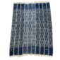 Full view of the deep blue cotton cloth with columns of pale dashes on a white background
