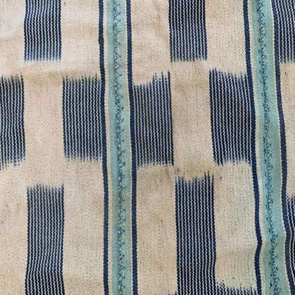 bashiri-indigo-cotton-242-keta-handwoven-african-textile-4 Close-up of the pale cotton cloth with a stepped pattern of indigo blocks