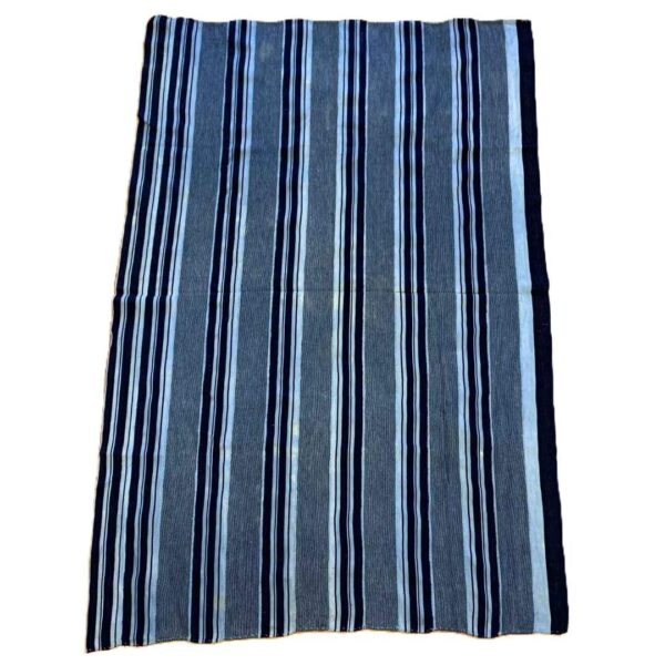 bashiri-indigo-cotton-244-akosombo-african-textile-handwoven-2 Full view of the grey-blue cotton cloth with bands of dark and pale stripes on a white background