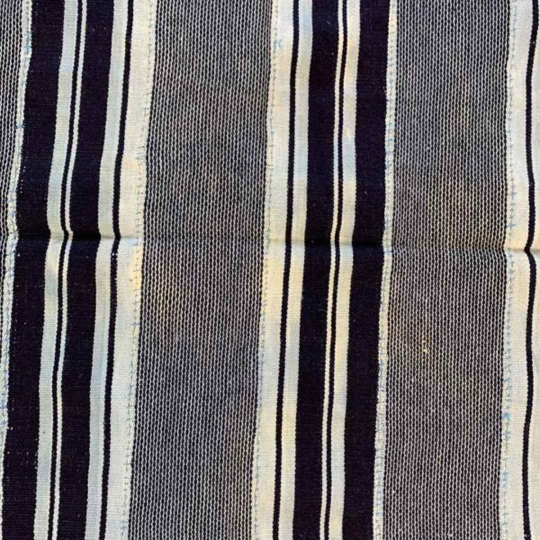 bashiri-indigo-cotton-244-akosombo-african-textile-handwoven-4 Close-up of the grey-blue cotton cloth with bands of dark and pale stripes