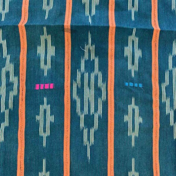 bashiri-indigo-cotton-245-damongo-african-cotton-fabric-woven-3 Close-up of the green-blue cotton cloth with pale diamond motifs