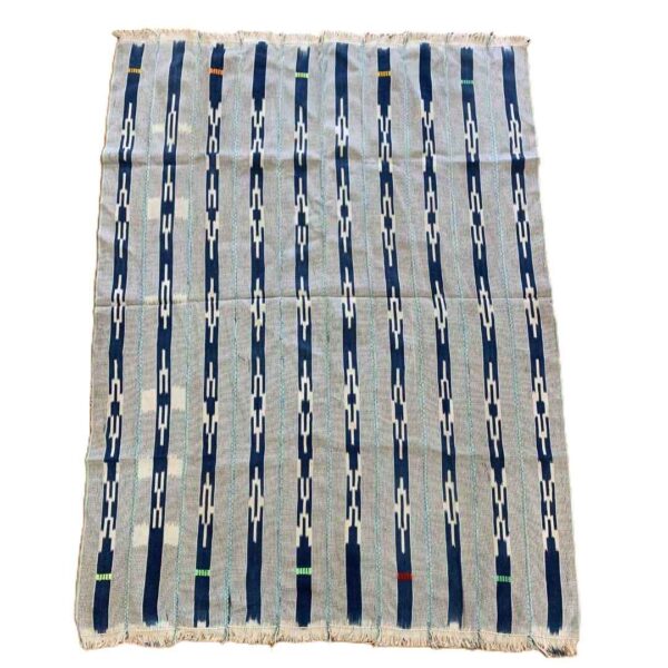 bashiri-indigo-cotton-246-walewale-handwoven-african-textile-2 Full view of the pale striped cotton cloth with narrow indigo motif columns on a white background