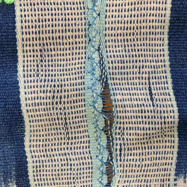 bashiri-indigo-cotton-246-walewale-handwoven-african-textile-4 Close-up of the pale striped cotton cloth with narrow indigo motif columns
