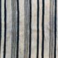 Close-up of the pale cotton cloth with faded indigo stripes