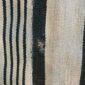 Close-up of the pale cotton cloth with faded indigo stripes