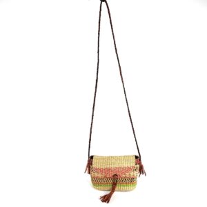bashiri-mini-shoulder-bag-003-spritz-coral-green-bolga-bag-handwoven-2 Full view of the coral and green mini Bolga shoulder bag with its plaited strap and leather tassels