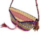 Close-up of the woven flap and leather toggle on the pink and purple mini Bolga shoulder bag