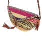 Close-up of the woven flap and leather toggle on the pink, black, and orange mini Bolga shoulder bag
