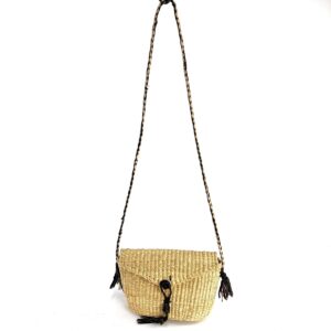 Full view of the natural undyed mini Bolga shoulder bag with its plaited strap and leather tassels