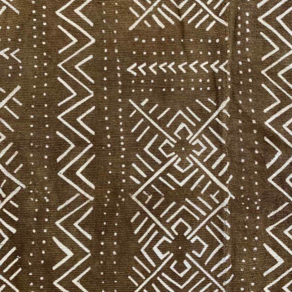 bashiri-mudcloth-medium-160-addax-bogolan-african-fabric-3 Close-up of the earth-toned mudcloth with pale zigzag and diamond panels