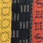 Close-up of the patchwork mudcloth with chevron, dot and flower motifs