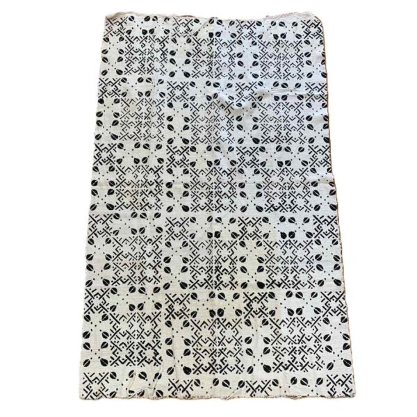 bashiri-mudcloth-medium-164-dorcas-bogolan-african-fabric-2 Full view of the medium light mudcloth with dark seed shapes and angular lines on a white background