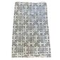 Full view of the medium light mudcloth with dark seed shapes and angular lines on a white background
