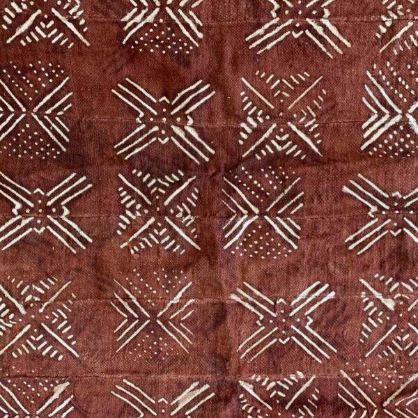 bashiri-mudcloth-small-150-hyrax-african-textile-bogolan-3 Close-up of the red-earth mudcloth with pale crossed diamond motifs