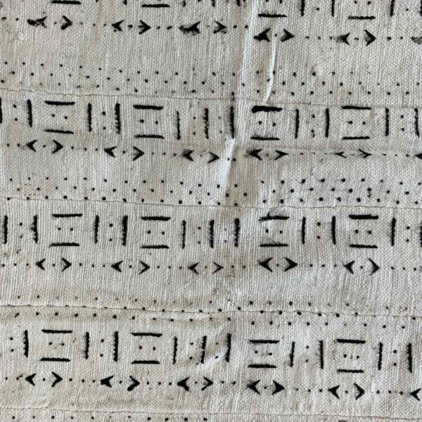 bashiri-mudcloth-small-151-silverbill-african-mud-cloth-fabric-3 Close-up of the light mudcloth with fine rows of dark dashes and arrows