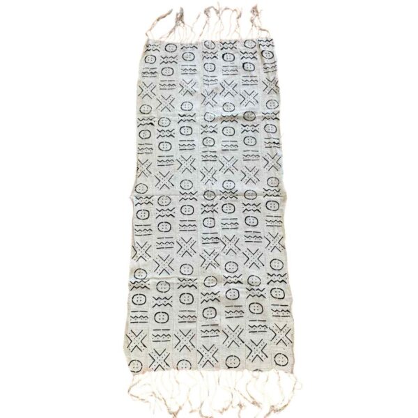 bashiri-mudcloth-small-153-hoopoe-bogolan-african-fabric-2 Full view of the small light mudcloth with rows of dark circles and crosses on a white background