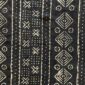 Close-up of the dark mudcloth with nested pale diamonds and dot grids
