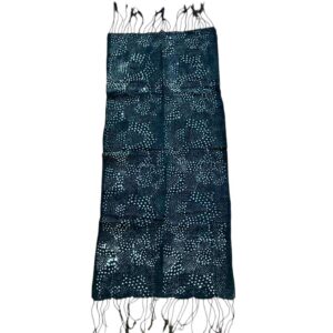 Full view of the small dark mudcloth with swirling arcs of pale dots on a white background