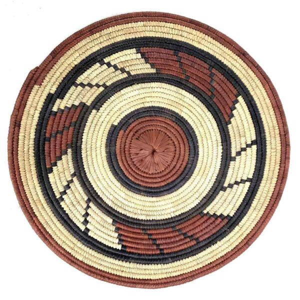 bashiri-placemat-179-radiance-african-platter-raffia-3 Full view of the rust, black and natural Burkina platter with a swirl pattern on a white background