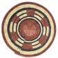 Full view of the rust, black and natural Burkina platter with a segment pattern on a white background