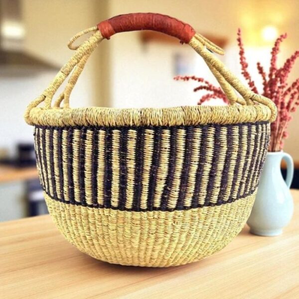 bashiri-xl-round-bolga-basket-natural-navy-stripe XL round Bolga basket handwoven from elephant grass in natural and navy vertical stripe pattern with leather handle, Bolgatanga Ghana