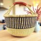 XL round Bolga basket handwoven from elephant grass in natural and navy vertical stripe pattern with leather handle, Bolgatanga Ghana