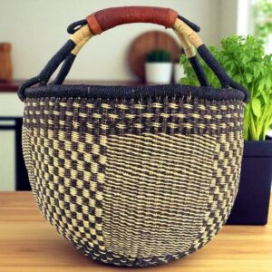 XL round African Bolga basket in navy and natural elephant grass diamond weave pattern with leather handle, handcrafted in Ghana