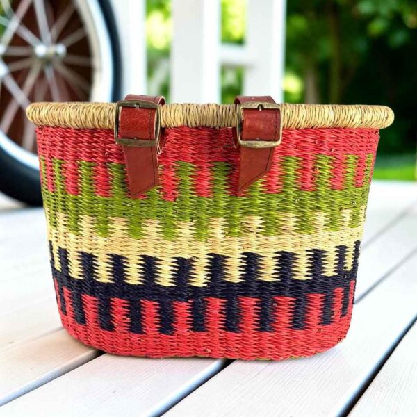 bicycle-basket-135-kob-main Red Bolga bike basket with green, natural, and navy stepped bands, leather straps and buckles