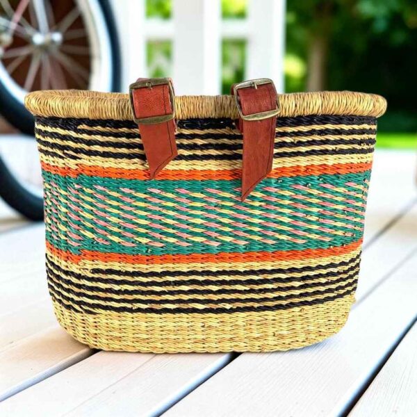 bicycle-basket-137-eland-main Natural Bolga bike basket with black pinstripes and orange, teal, and pink band, leather straps and buckles