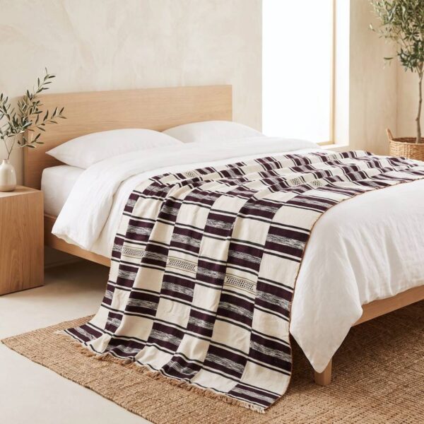 Handwoven Sahel cotton blanket, horizontal striped pattern with an open-weave dot band