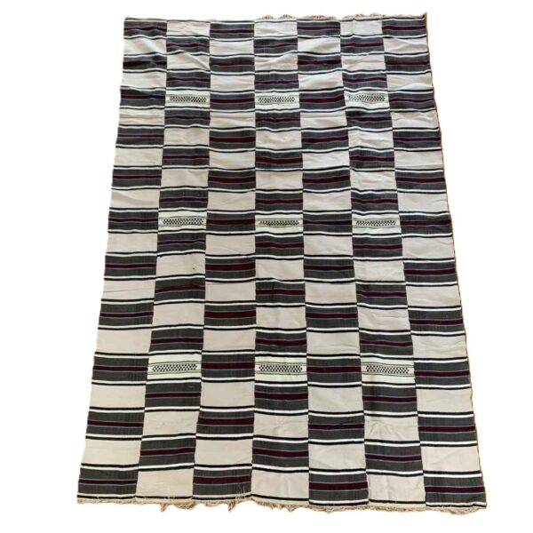 blanket-sahel-018-segou (1) Detail of the striped pattern of varying width with an open-weave band on this handwoven Sahel cotton blanket