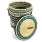 Angled view of the navy and teal chevron closed laundry basket showing the woven lid